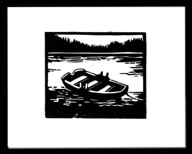 en pram ligger på et stille tjern